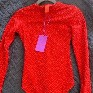 NWT, Fendi/Skims orange bodysuit, size small.